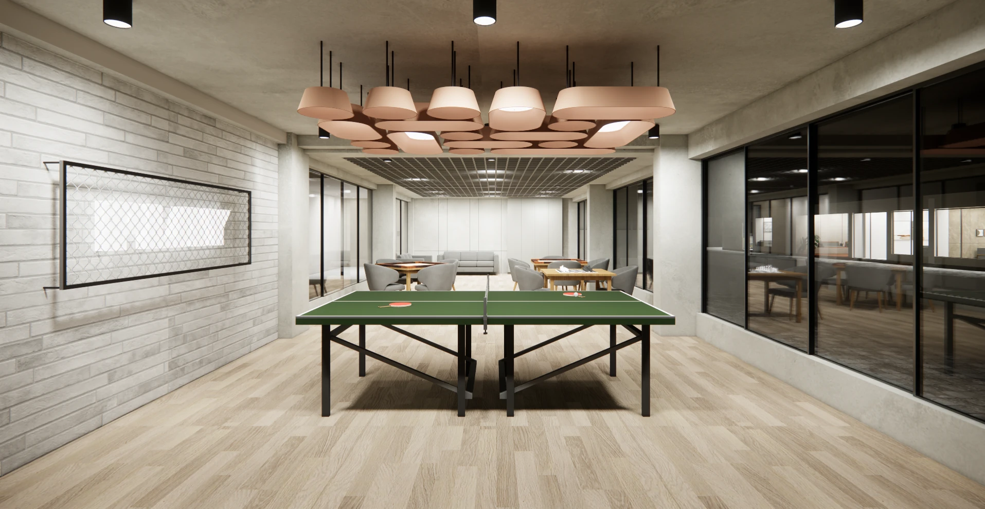 Indoor play area with carrom, table tennis, foosball and chess at Areca PG, Ahmedabad
